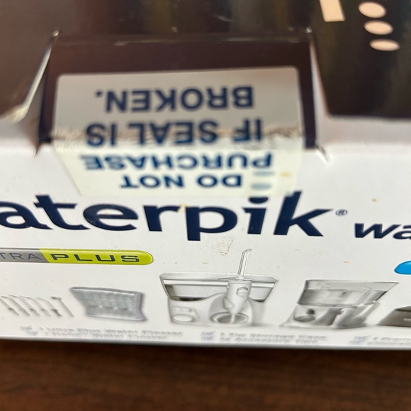 Waterpik water flosser- new unsealed - Picture 3 of 3